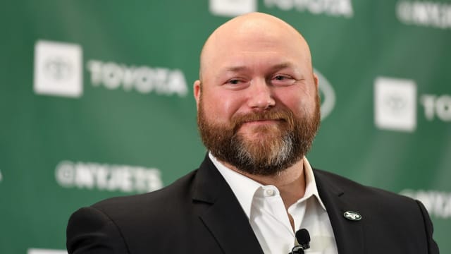 Jets' general manager Joe Douglas smiles at a press conference